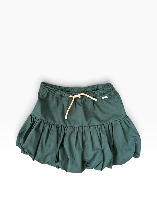 A dark green bubble ruffled skirt for tweens, featuring an elastic waistband and a cream-colored drawstring tie, shown flat on a white background.