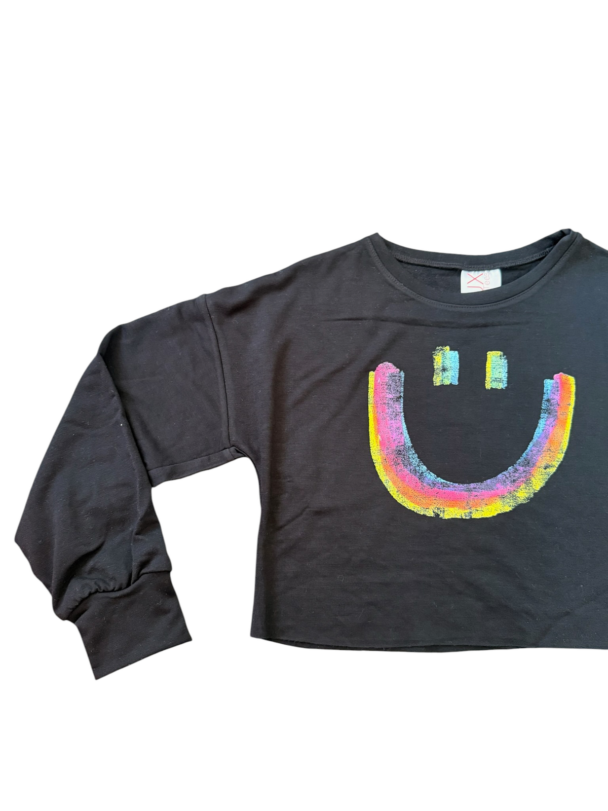 A black long-sleeve crop top sweatshirt featuring a colorful, rainbow distressed smiley face graphic on the front, laid flat against a white background.